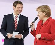 Rene Obermann e Angela Merkel