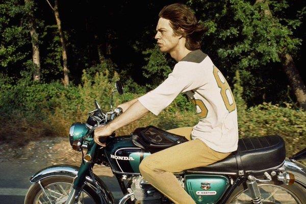 Mick Jagger riding a motorcycle, 1971