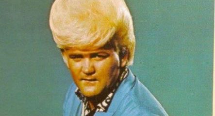 Duelli mortali: Wayne Cochran e la sua acconciatura. Contro di lui Donald Trump non ce la può fare